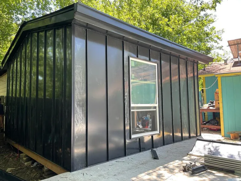 Black standing seam metal wall panels for Roof Inspection in Claremont